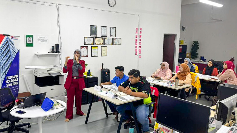 A trainer leading a session with a small office team