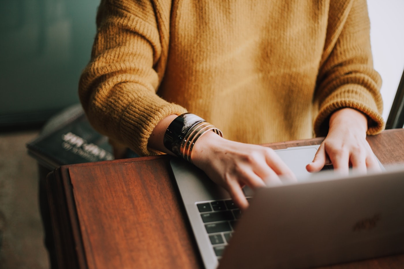 A learner working through a course module on a laptop