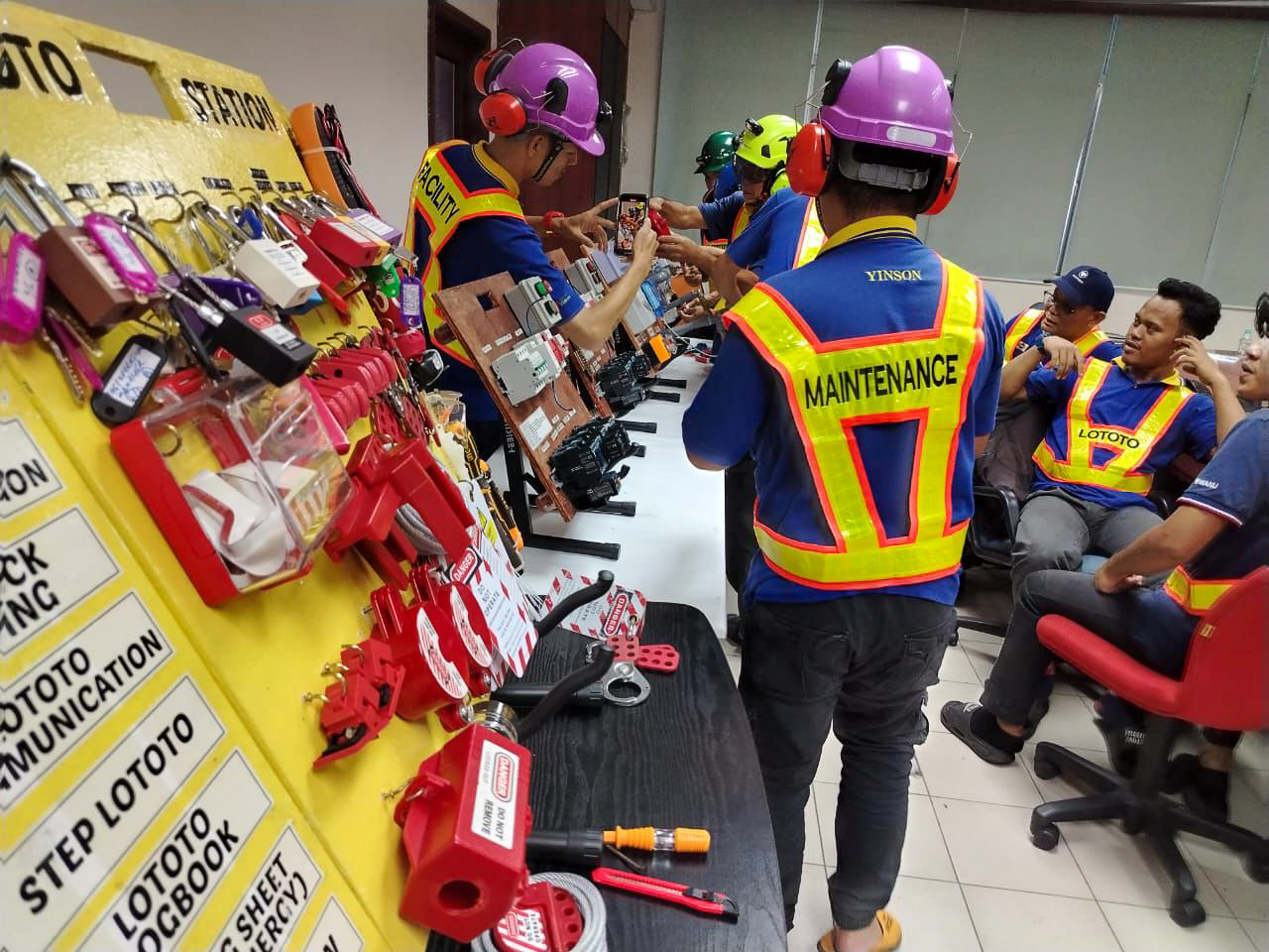 Maintenance crew practising lock-out tag-out procedure