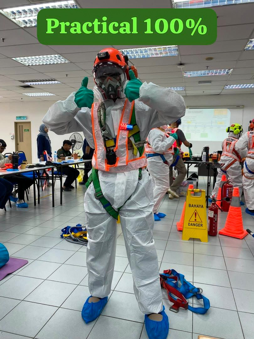 A participant in full protective equipment during a safety drill