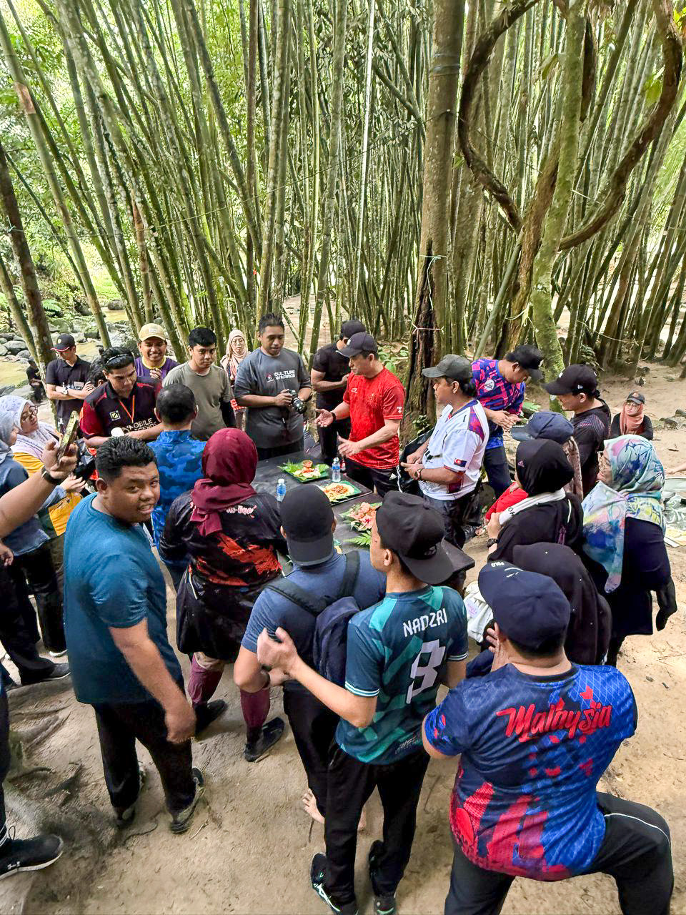 A team gathered together outdoors during a retreat