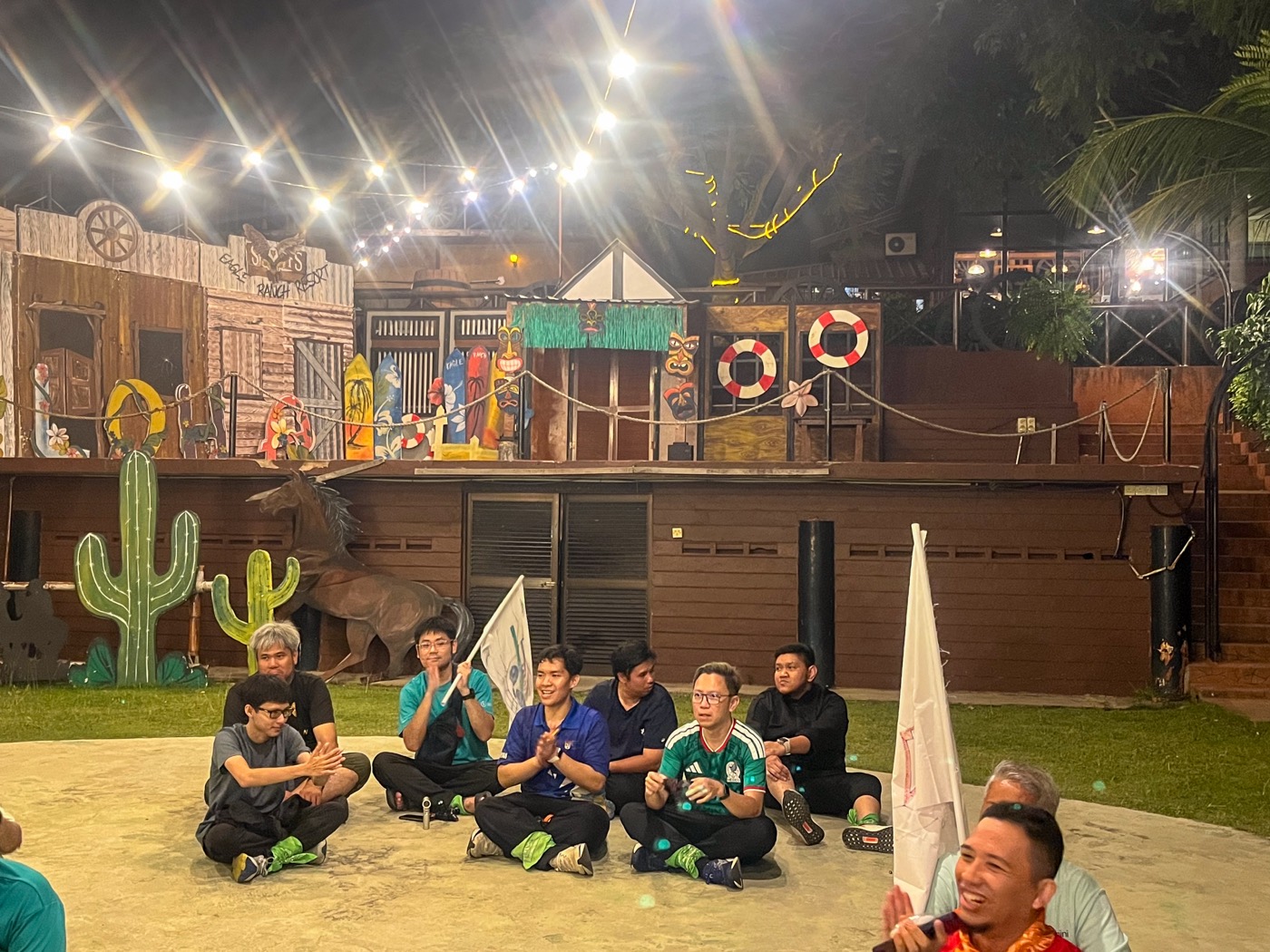 A team relaxing together at the end of a retreat evening